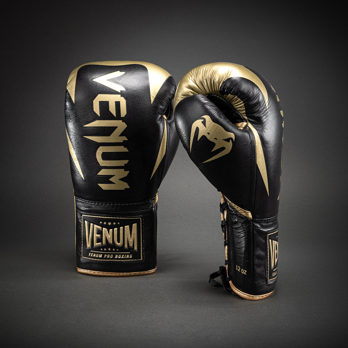 Guantoni da boxe professionali Venum Hammer con lacci - Nero/Oro