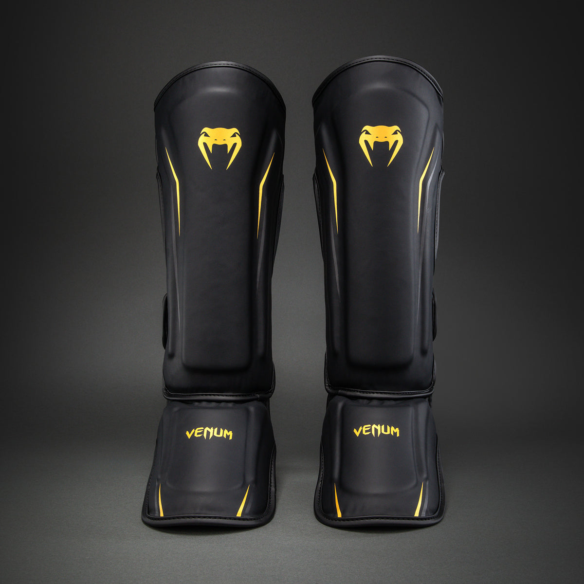 Venum G-Core Paratibie - Nero/Oro