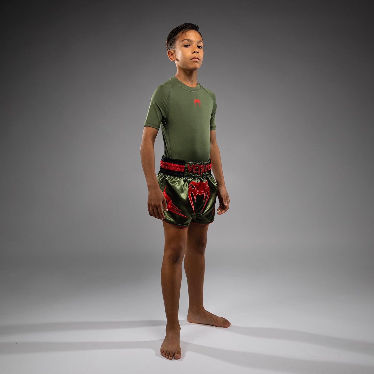Venum Inferno Pantaloni Muay Thai per Bambini - Verde Militare/Arancione