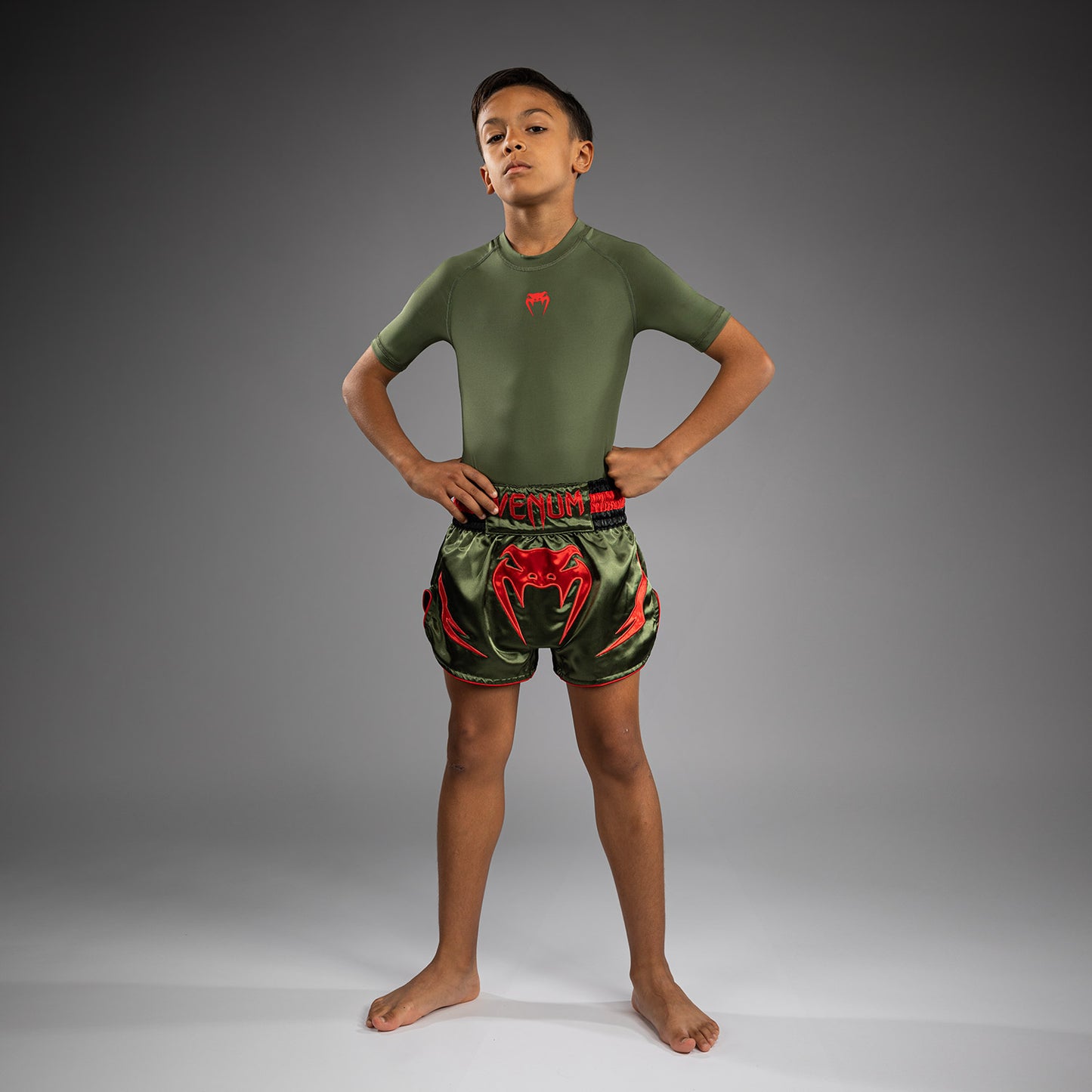 Venum Inferno Pantaloni Muay Thai per Bambini - Verde Militare/Arancione