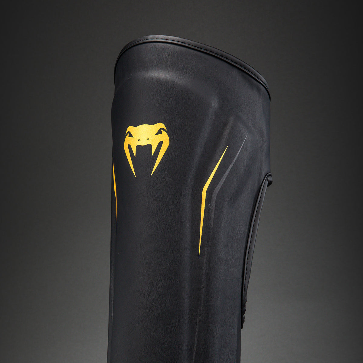 Venum G-Core Paratibie - Nero/Oro