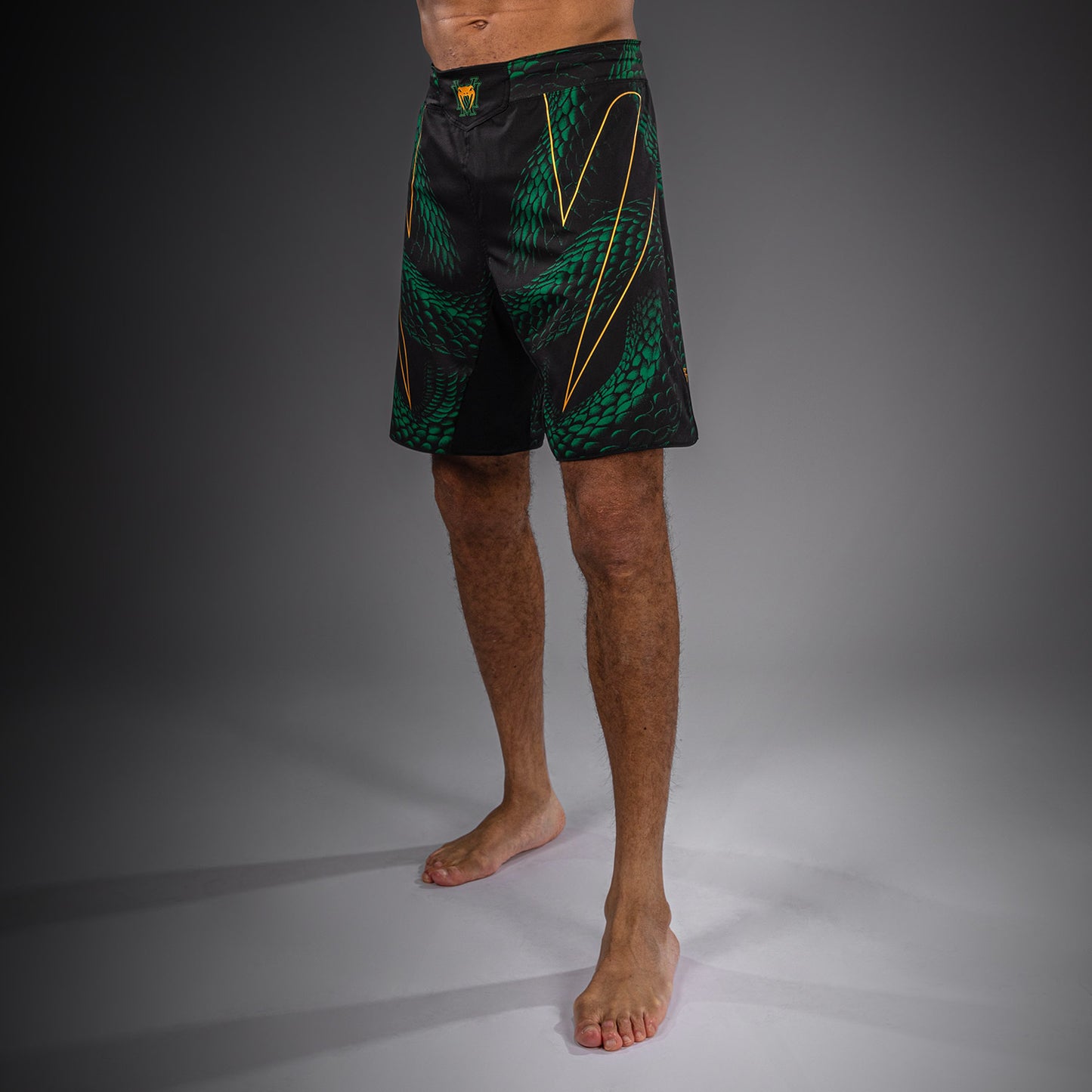Venum Matupa Pantaloncini da Combattimento - Nero/Verde/Oro