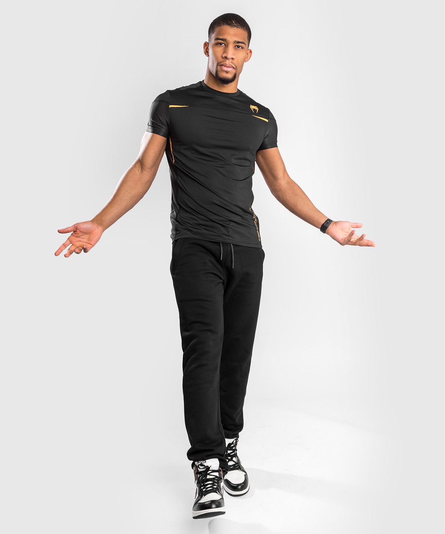 T-shirt Venum Tempest 2.0 Dry Tech - nero/oro